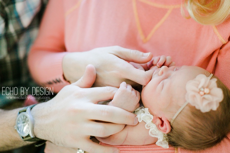 Newborn Baby holds Daddys Hand