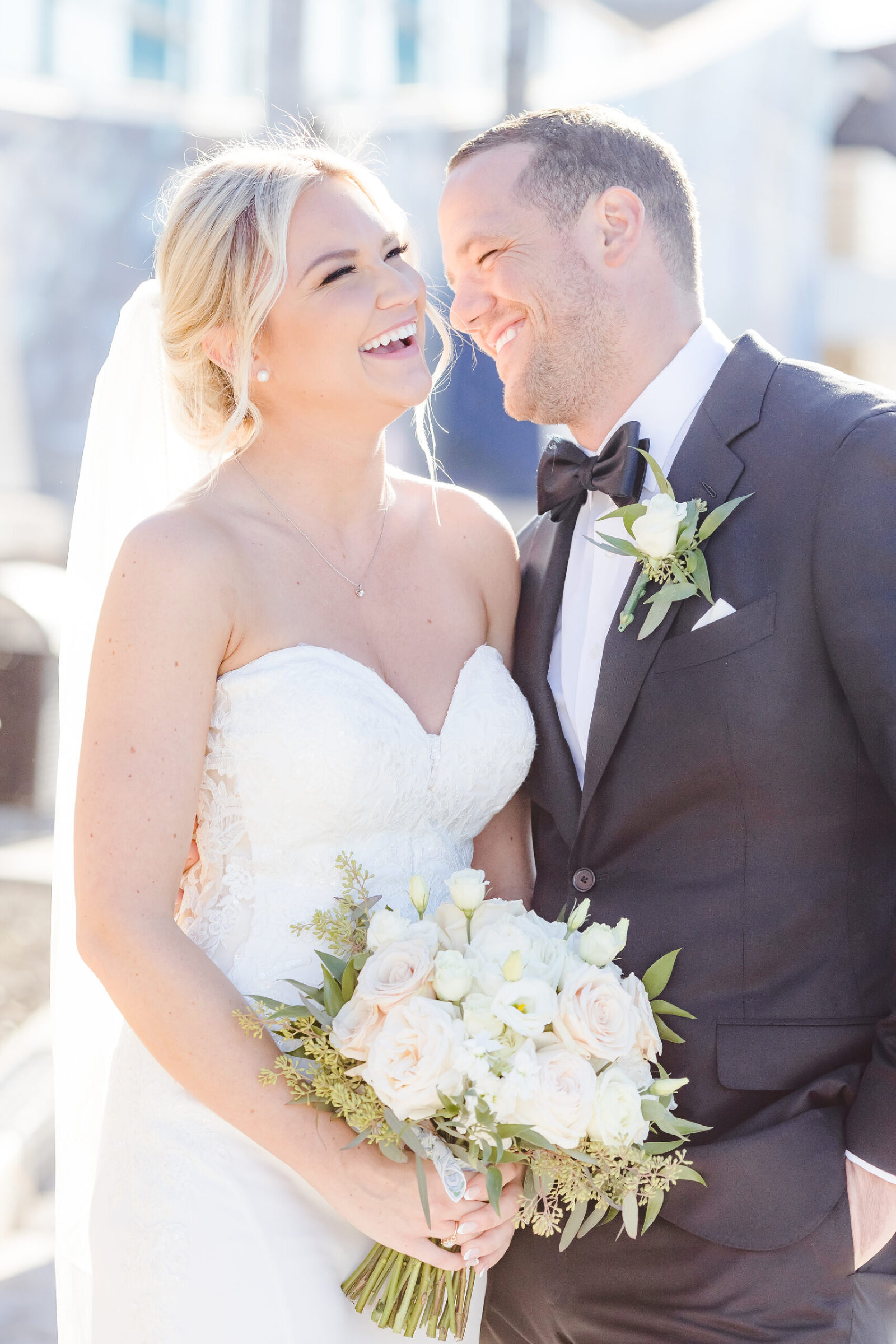Bride and Groom Laughing on Wedding Day